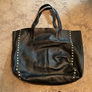 Black soft leather handbag. Both bags have a removable interior section